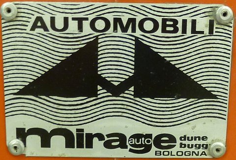 Metal plate with wavy black lines, a large stylised M and the words Automobili, mirage auto, dune buggy, Bologna. Opens a larger view