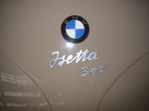 BMW roundel and chrome Isetta 300 script on tan paint. Opens a larger view