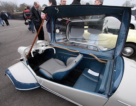 A grey and blue KR200 with its whole canopy swung open to the side, showing the two seats one behind the other