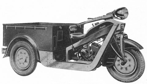 Black and white side view of a three-wheeler with a long open cargo box and a Mazda-lettered tank. Opens a larger view