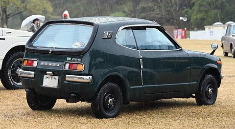 Rear three-quarter of a black hatchback with a GSS badge and three-colour tail lamps. Opens a larger view